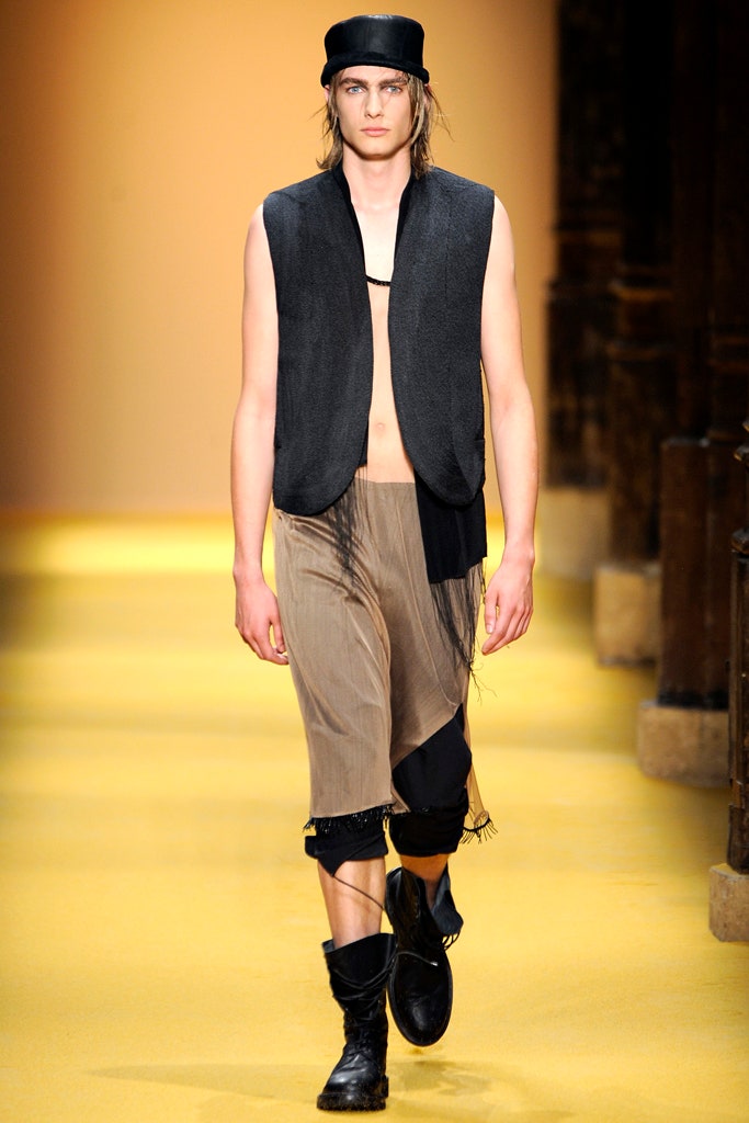 black vest beige cropped pants