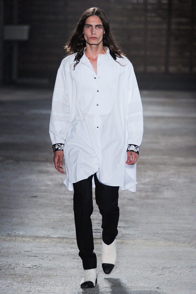 white relaxed shirt with black pants