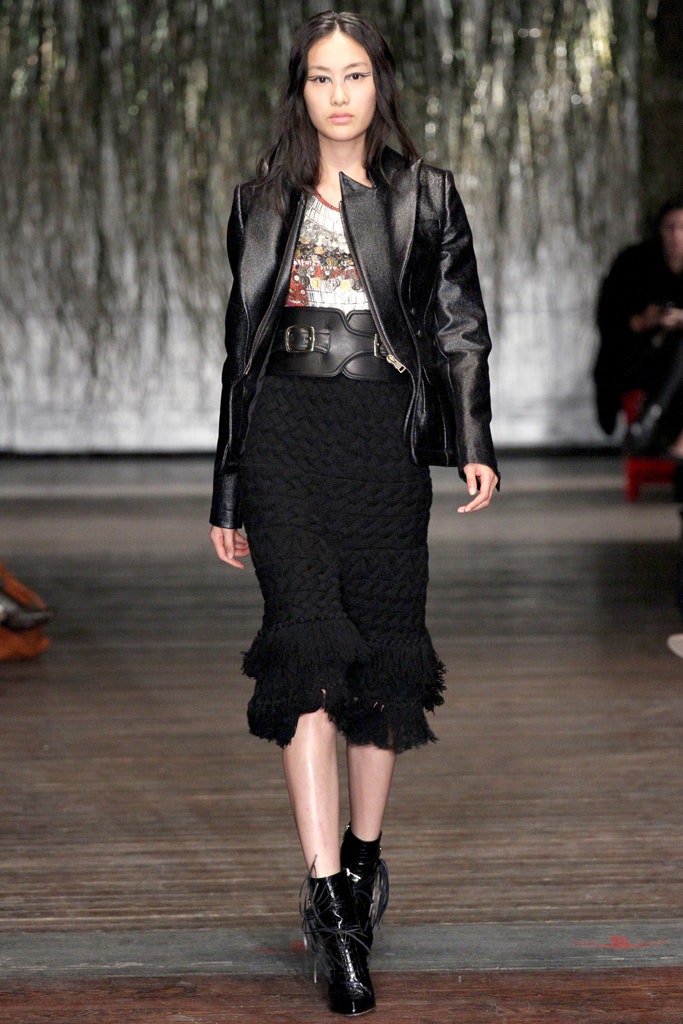 black leather jacket and ruffled skirt
