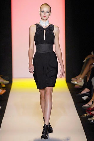 fitted black sleeveless dress