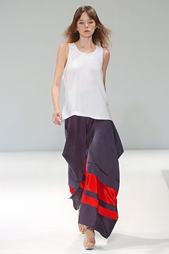 white relaxed top with asymmetric skirt
