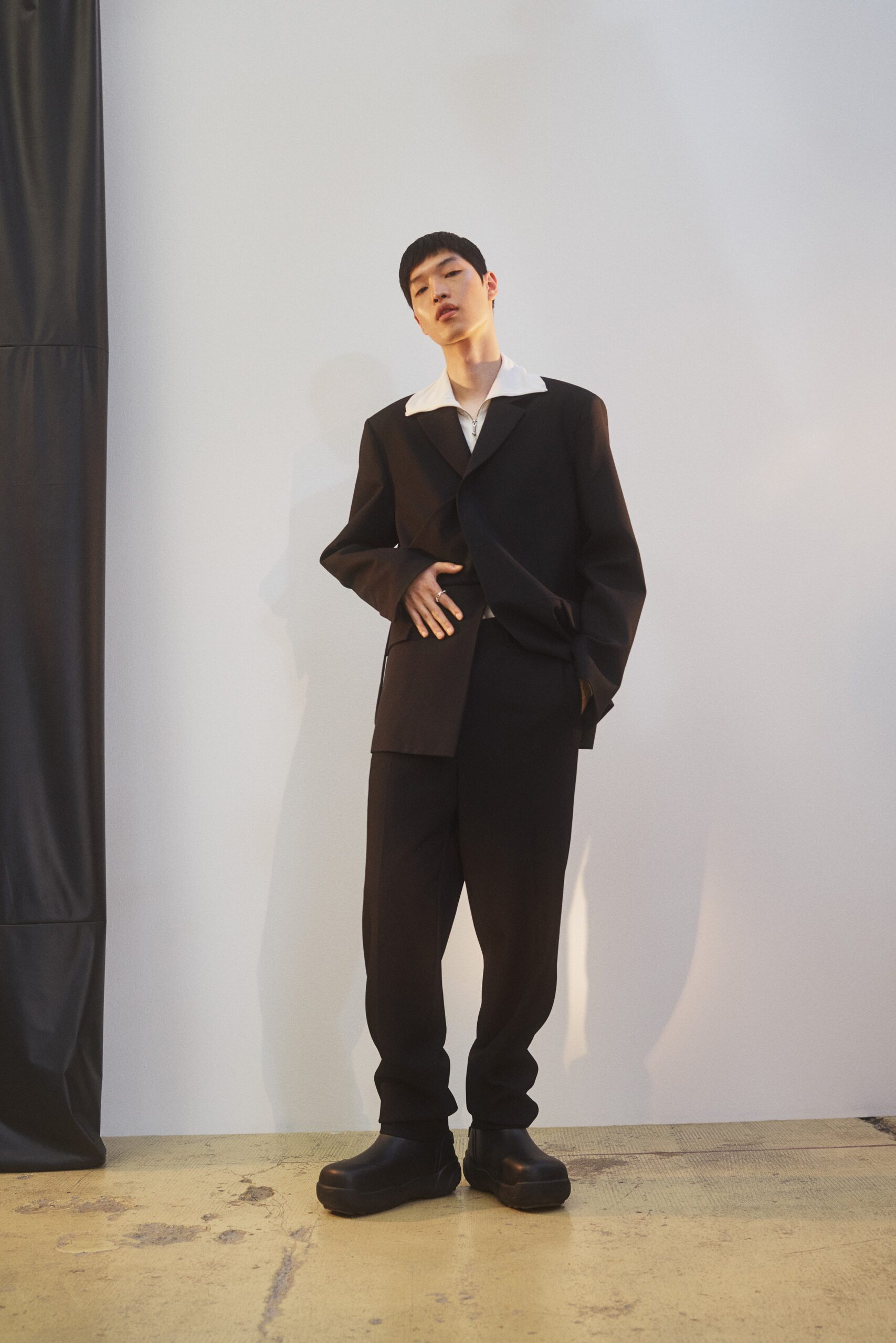 black tailored suit with chunky shoes