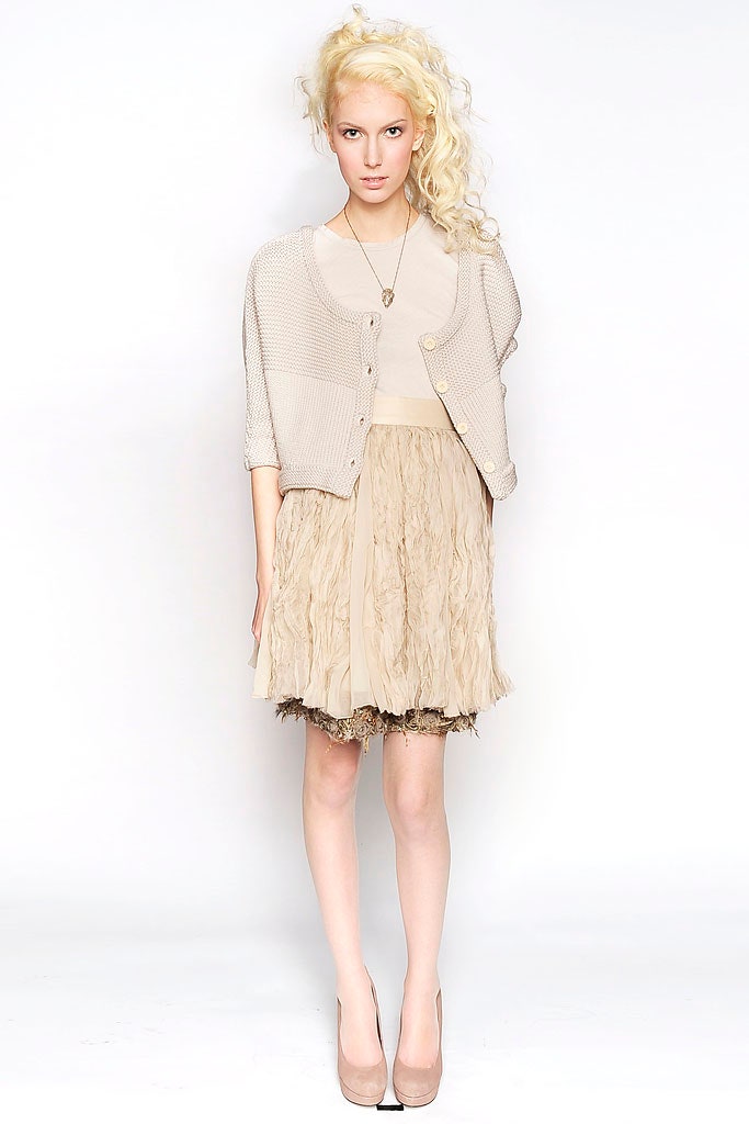 beige cardigan with pleated skirt