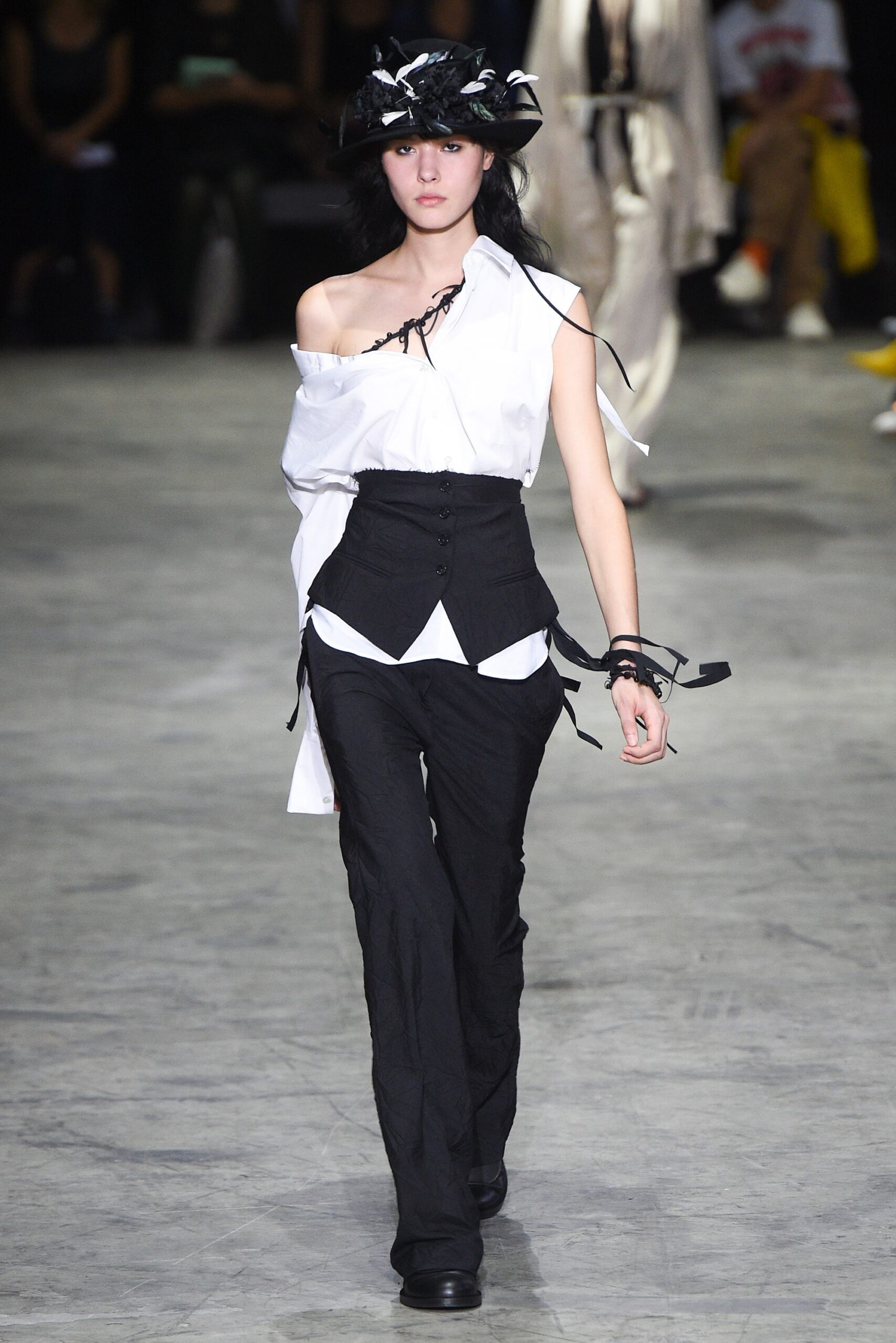 white off-shoulder shirt with black pants