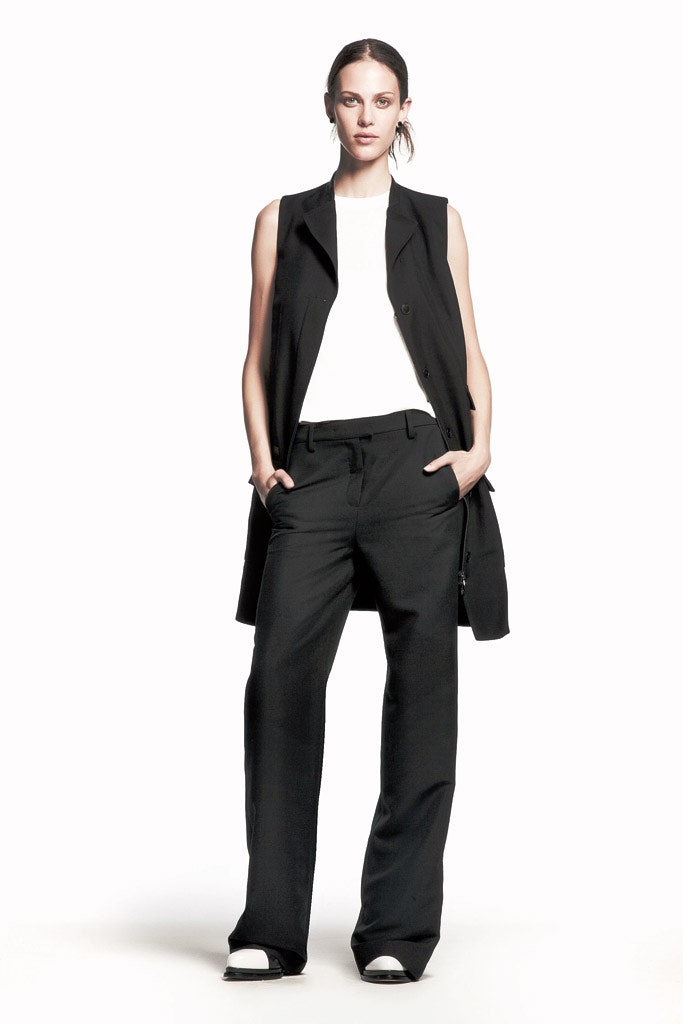 black vest white top black pants