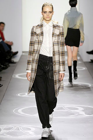 beige checked coat with black pants