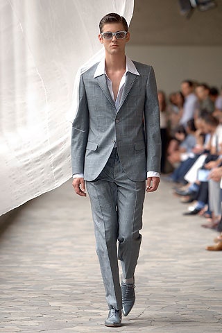 gray tailored suit with sunglasses
