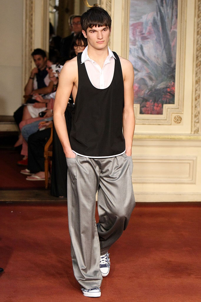 black tank-top gray pants