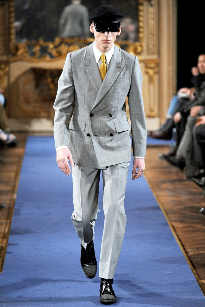 gray tailored suit with yellow shirt