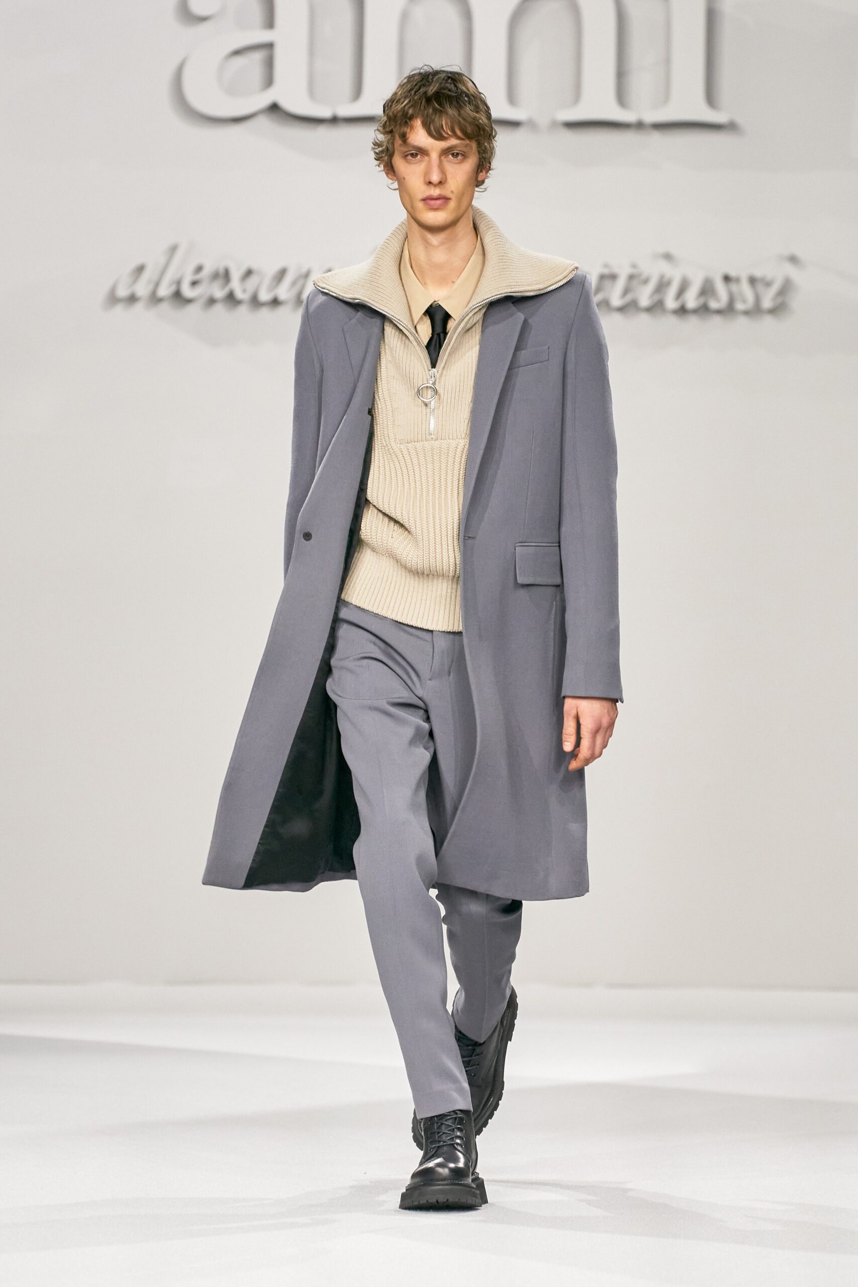 gray wool coat with beige sweater