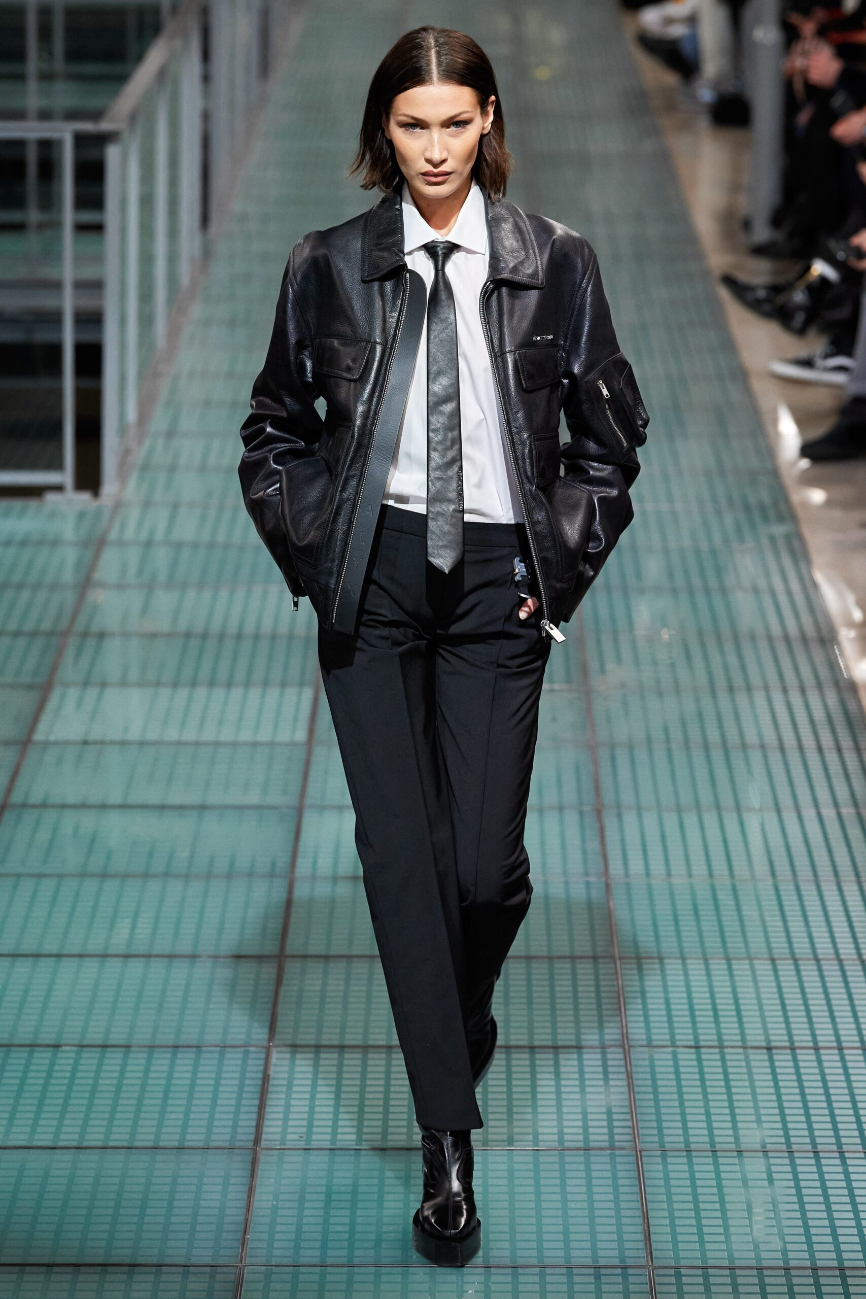 black leather jacket with tailored pants