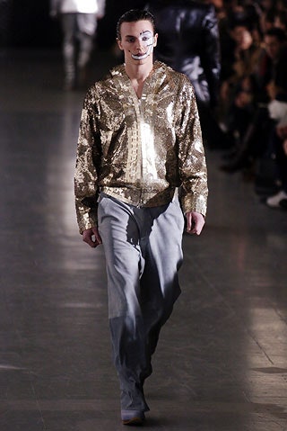 gold sequin shirt with gray pants