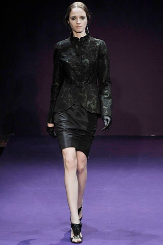 black fitted jacket and skirt