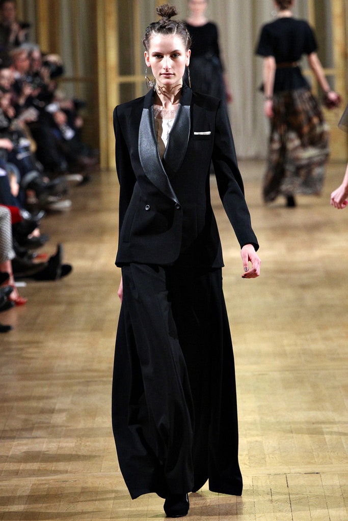 black fitted suit with wide-leg pants