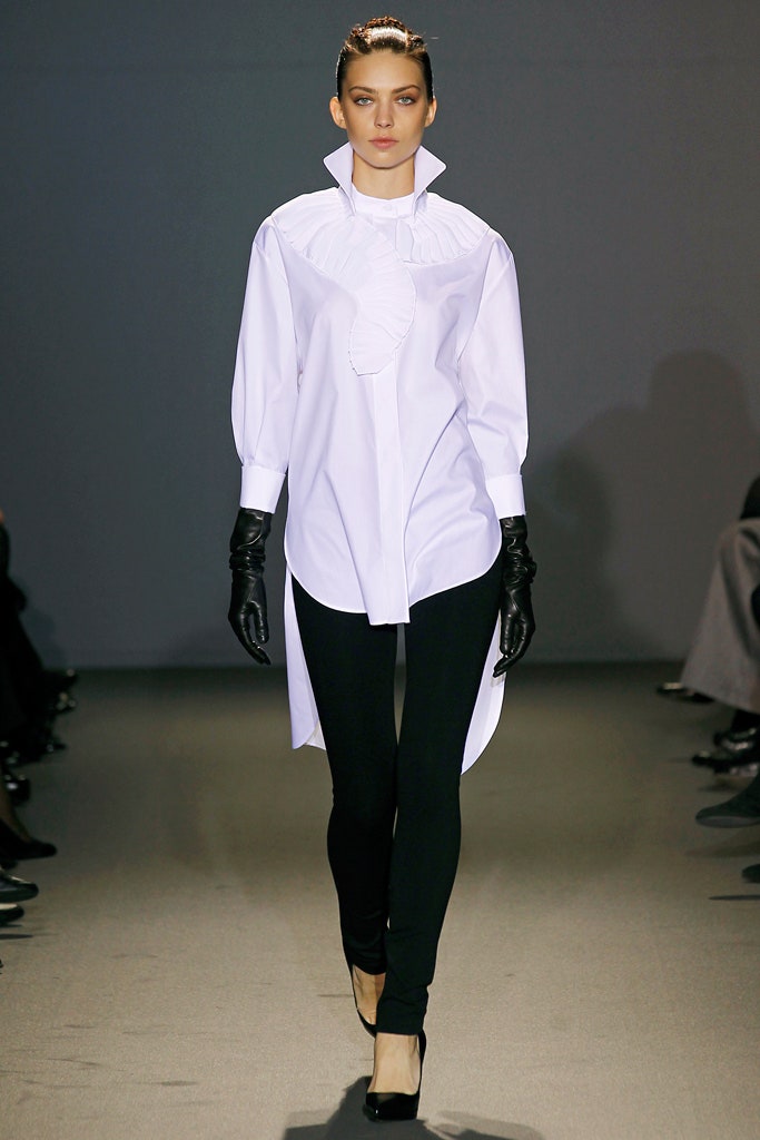 white fitted shirt with black leggings