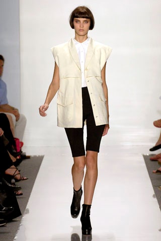 white relaxed vest with black shorts