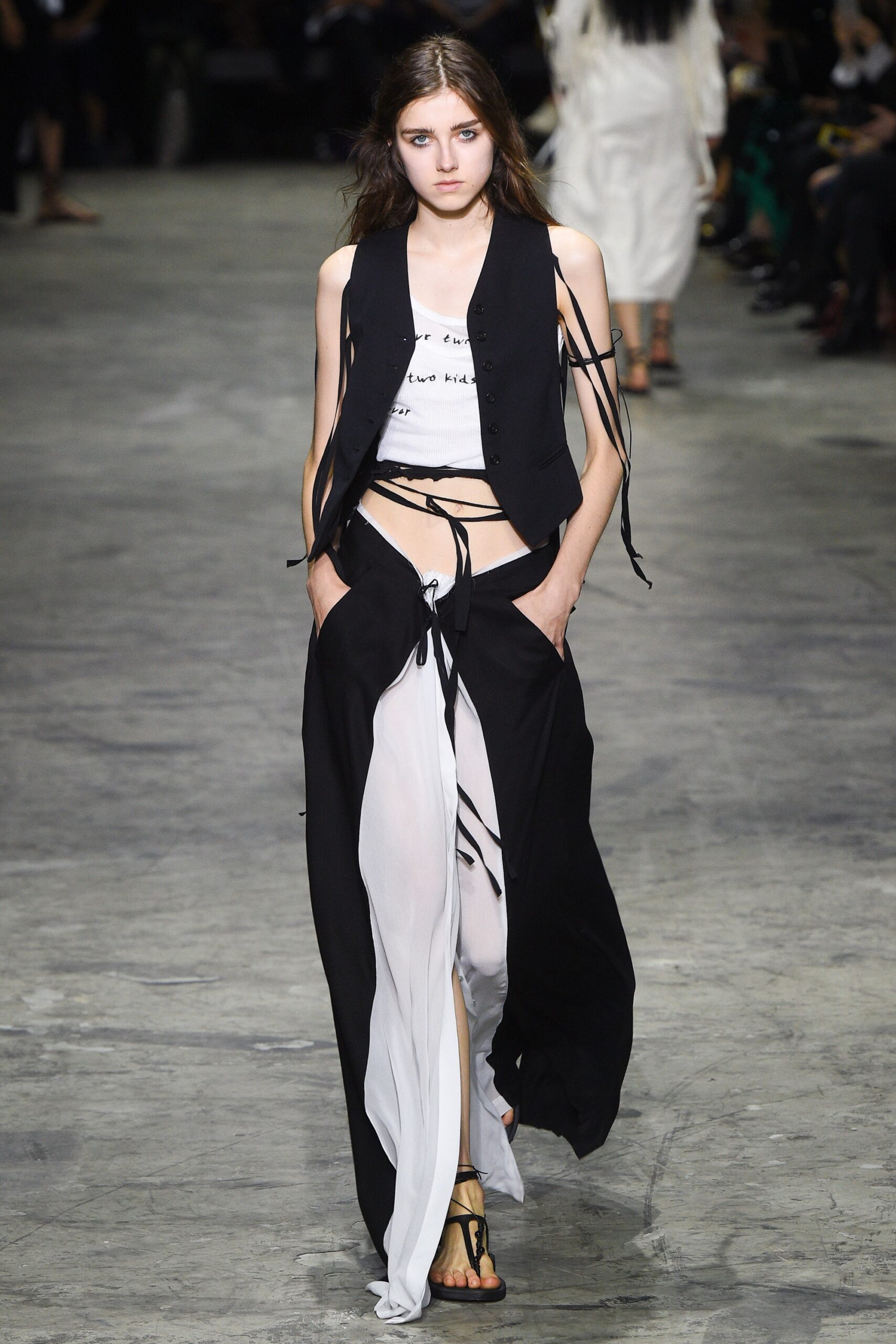 black vest white top layered skirt