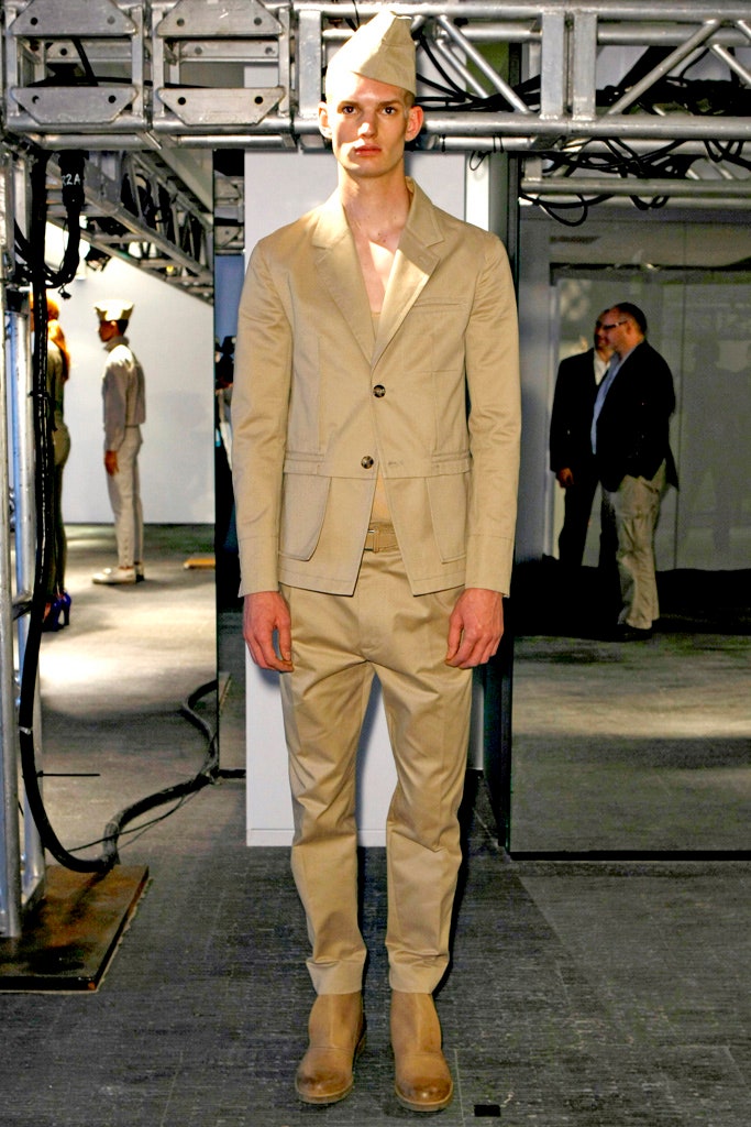 beige tailored suit with brown shoes