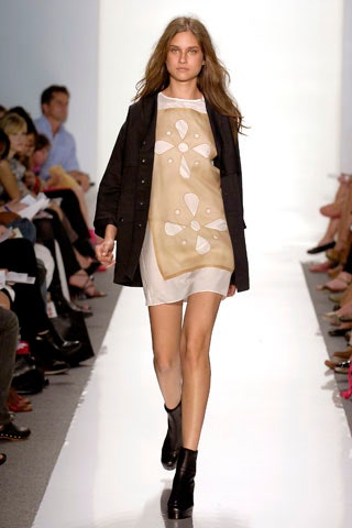 beige silk mini dress with black blazer