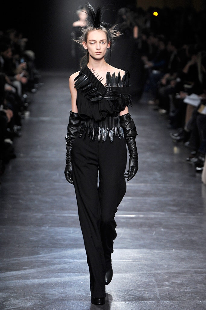 black fitted jumpsuit with gloves