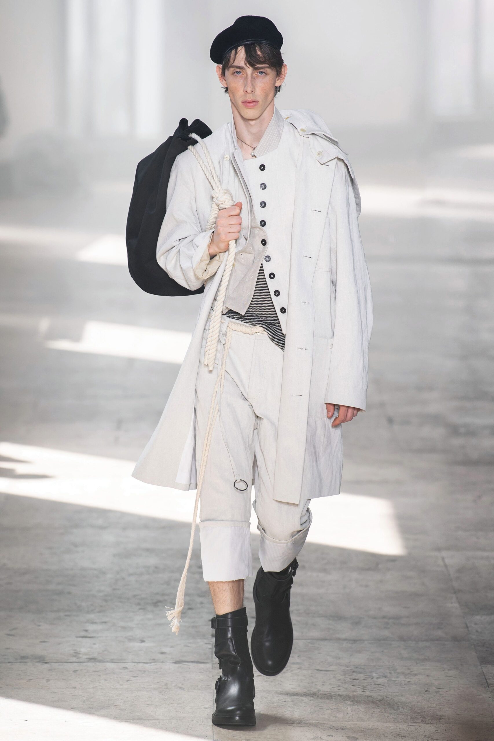 white cotton long-sleeve collared relaxed buttoned coat