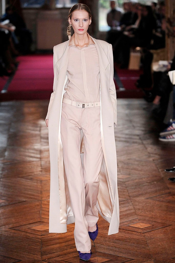 beige tailored coat with fitted shirt