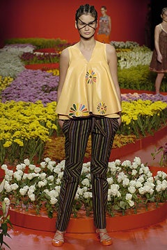 yellow embroidered top with striped pants