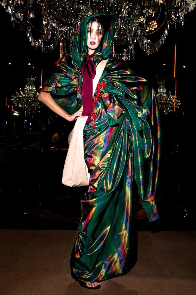 green silk draped gown