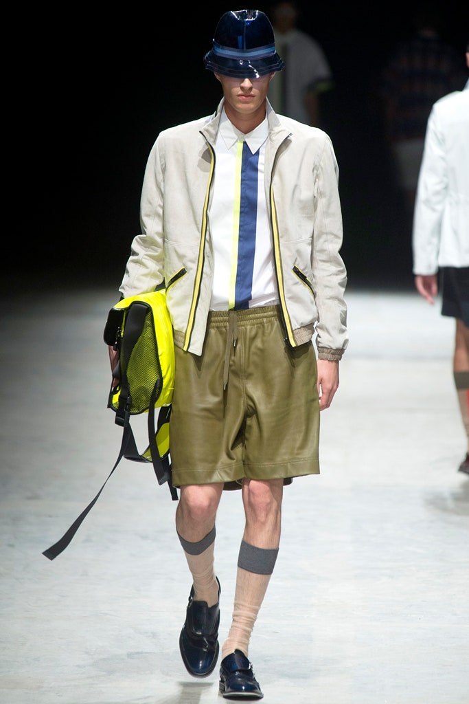 beige jacket with green shorts