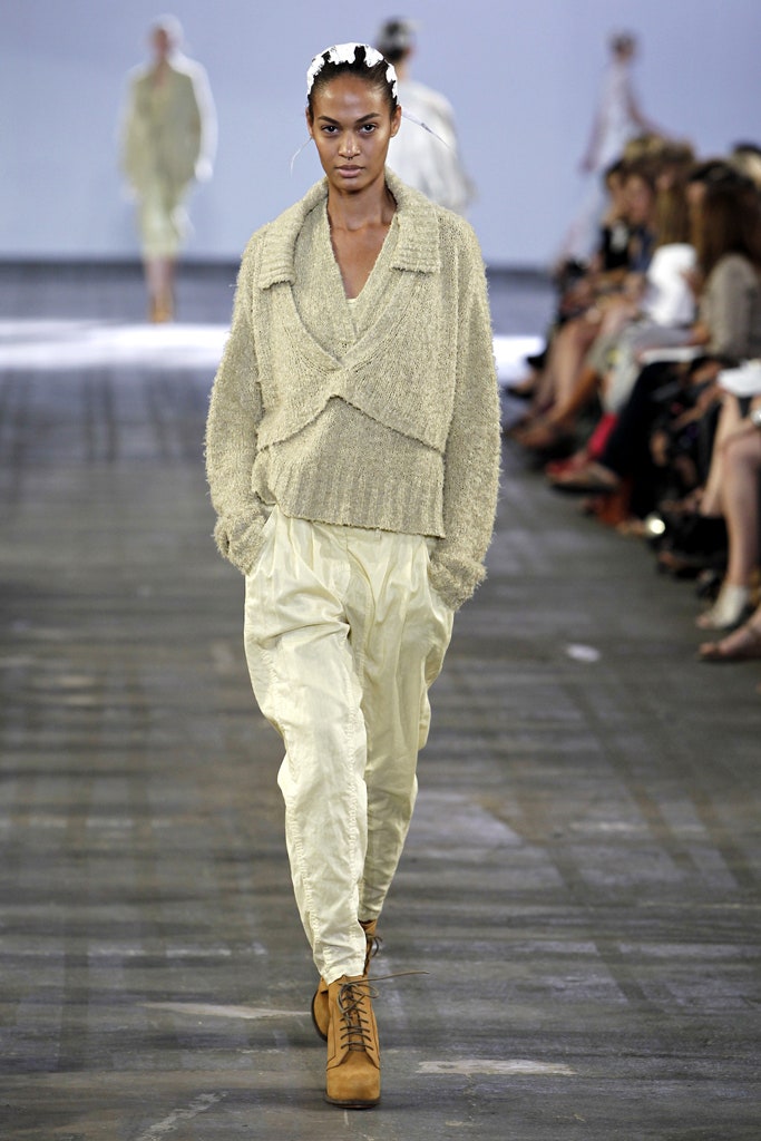 beige relaxed top with white pants