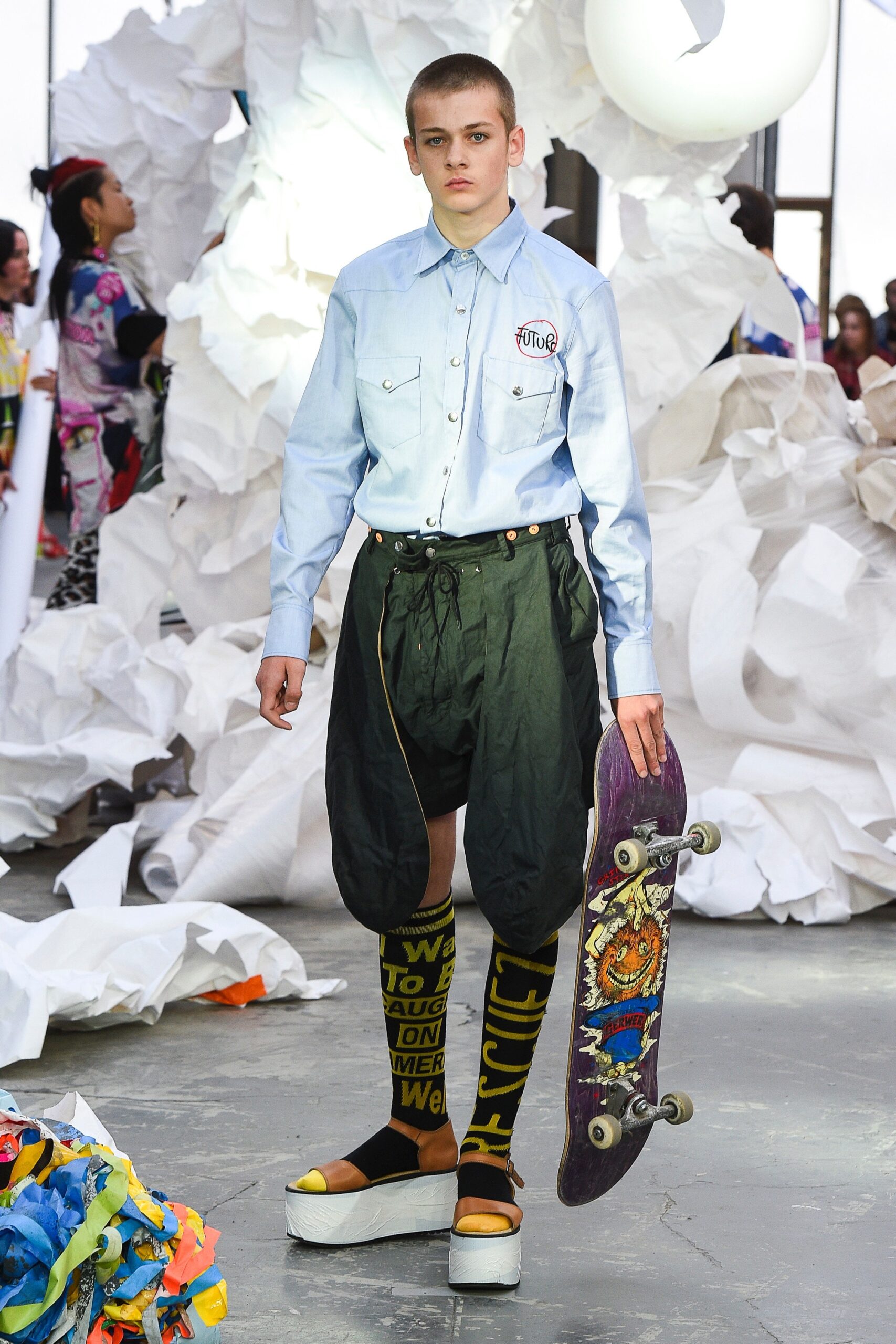 blue relaxed shirt with black pants