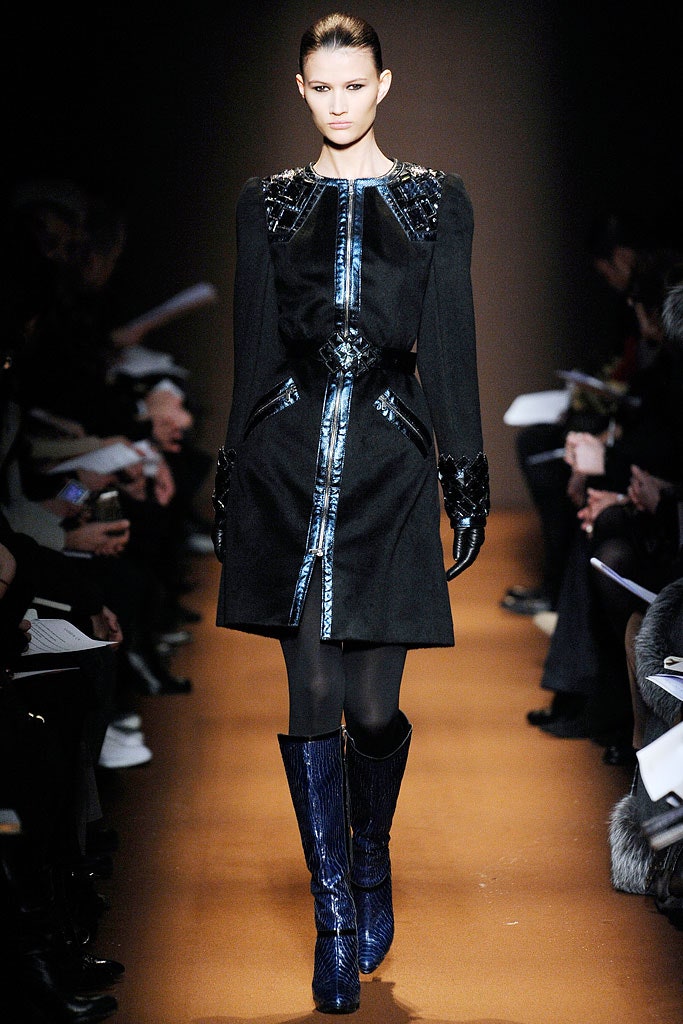 black fitted coat with blue boots