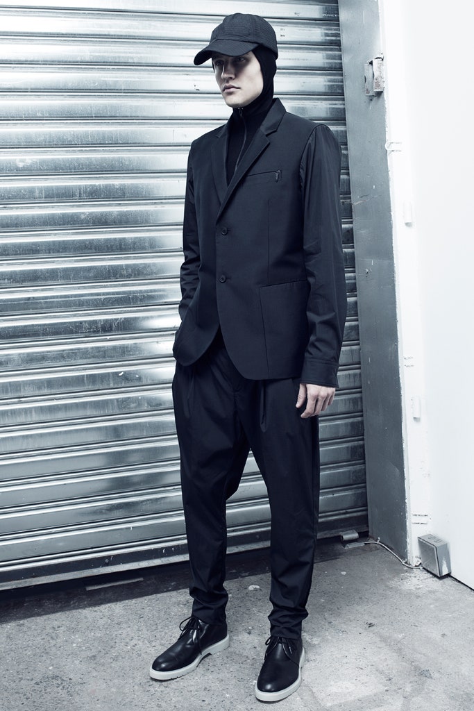 black tailored blazer and relaxed pants