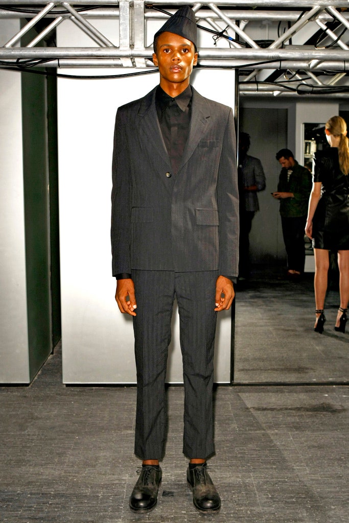 black tailored suit with hat