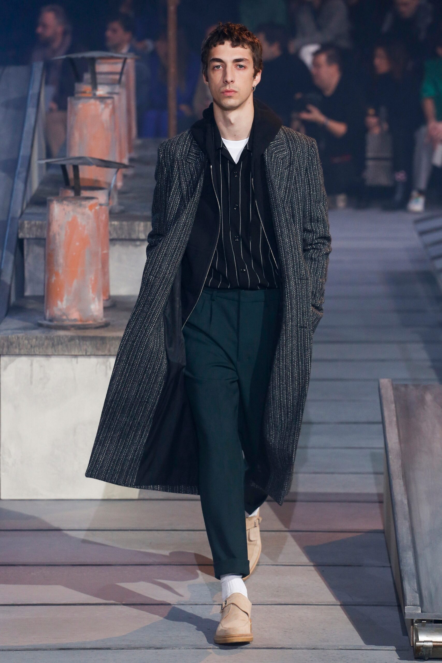 gray tailored coat with black hoodie