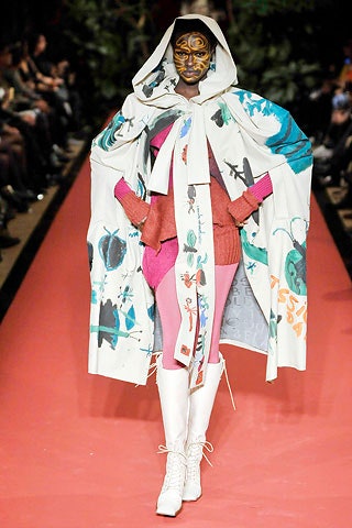 multi-colored printed cape with pink sweater