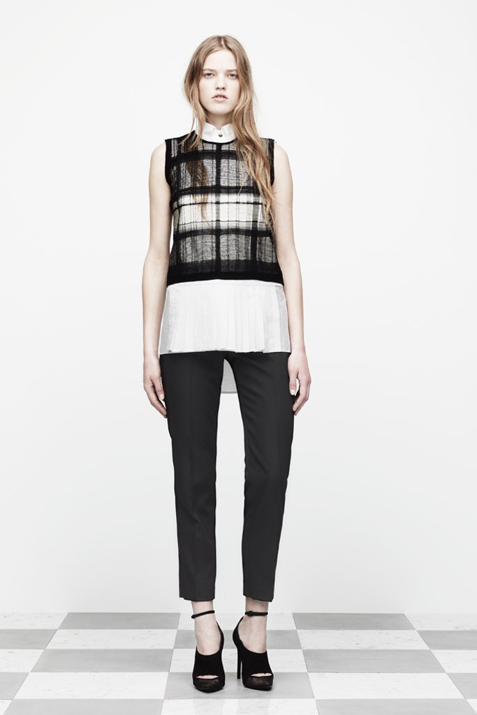 black and white fitted top with slim pants