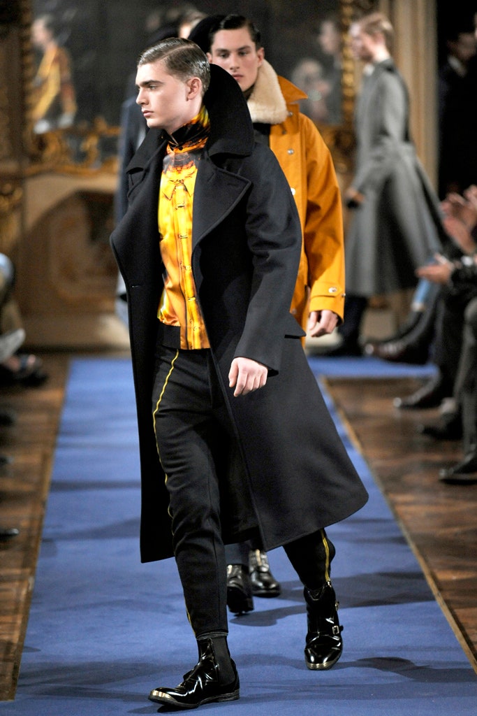 black wool coat orange silk shirt