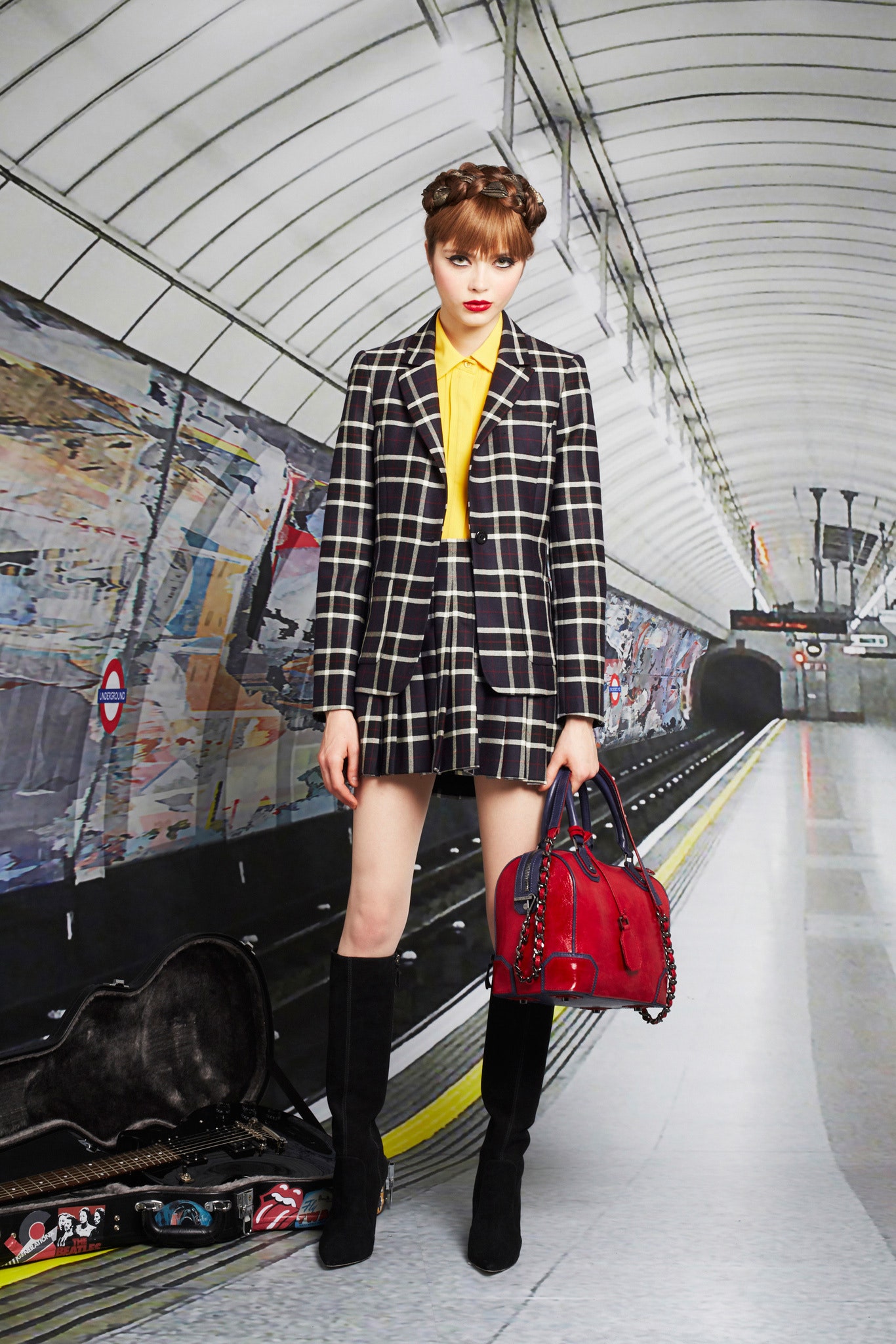 tailored black and white blazer with pleated skirt
