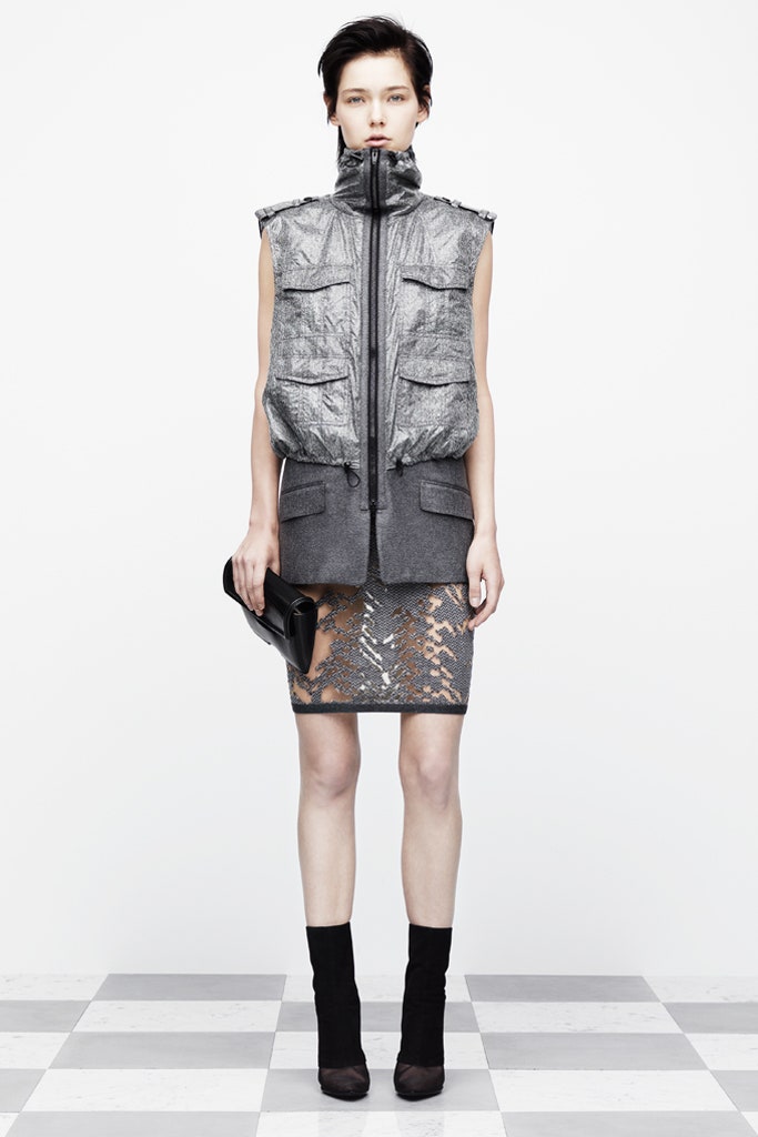 gray fitted vest with black lace skirt