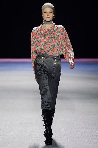 floral silk blouse with gray pants