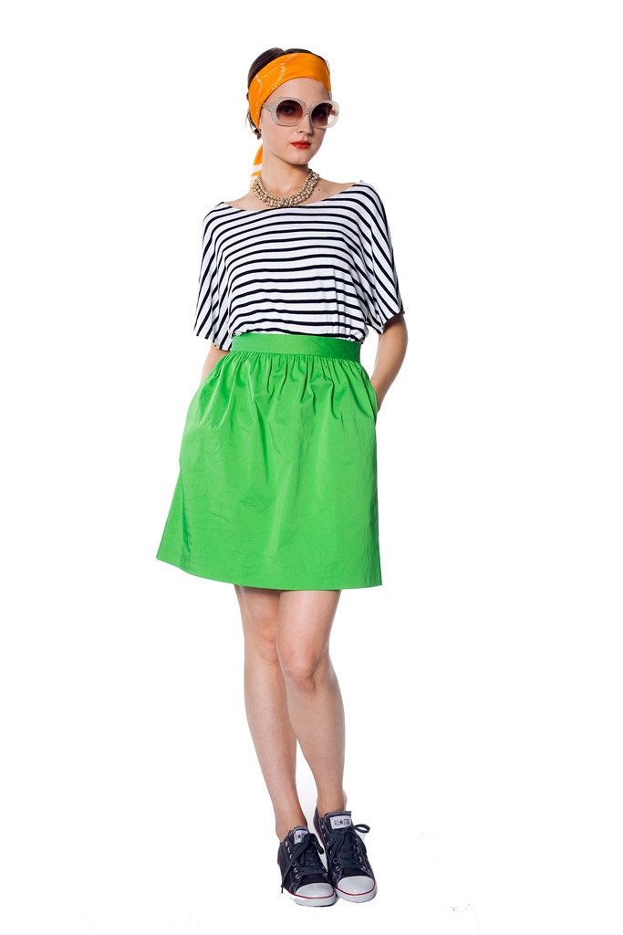 striped top and green skirt