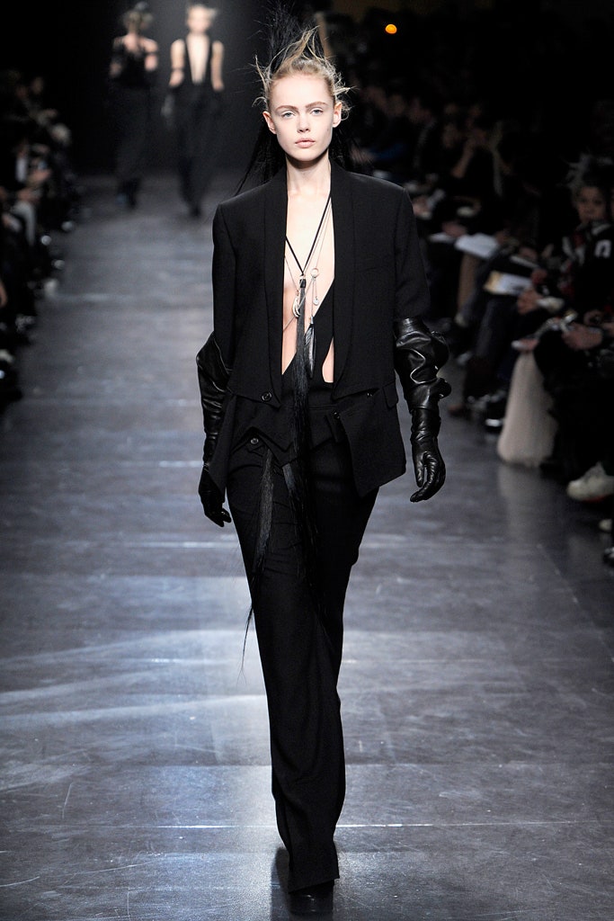 black tailored blazer and slim pants