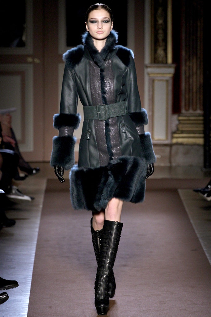 black leather long-sleeve collared fitted belted layered coat