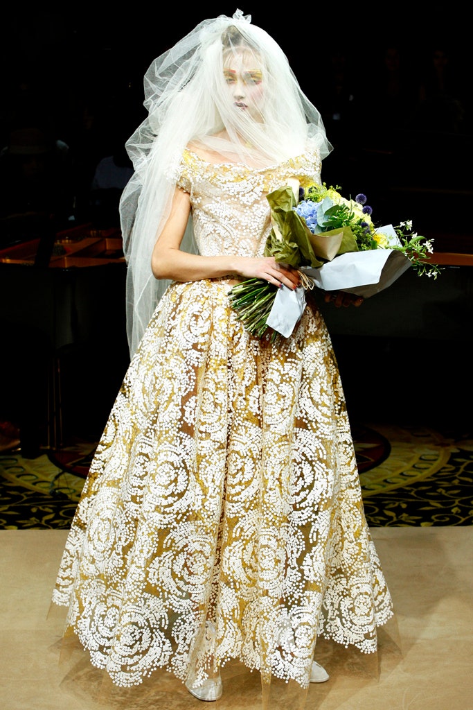 white and gold embroidered gown with veil