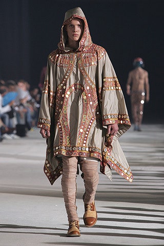 beige embroidered poncho with fitted pants