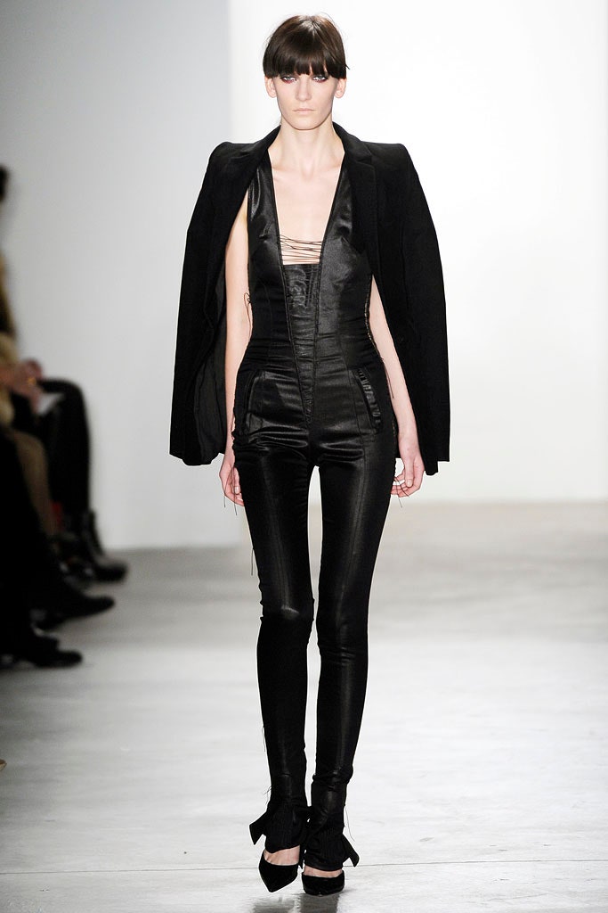 black fitted jumpsuit with cape