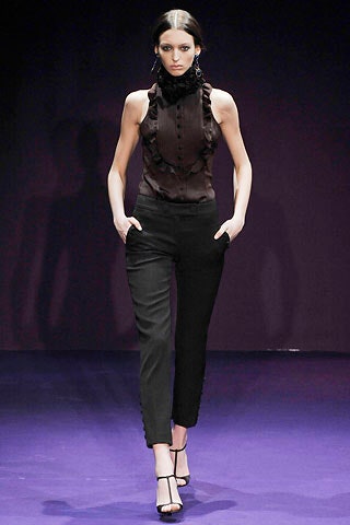 black fitted top and slim pants