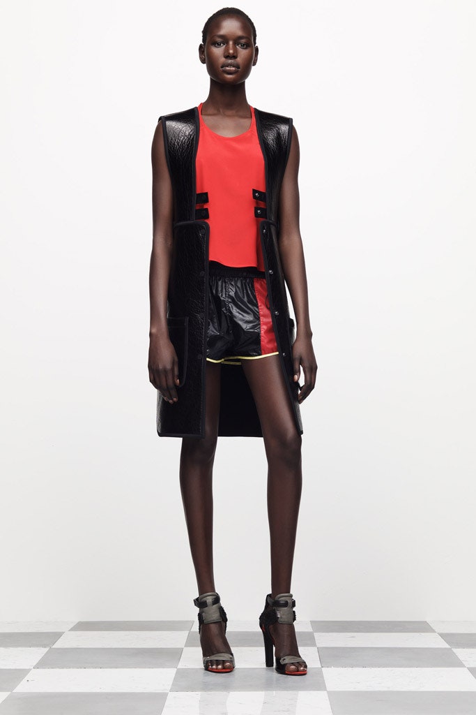 red silk top with black leather shorts