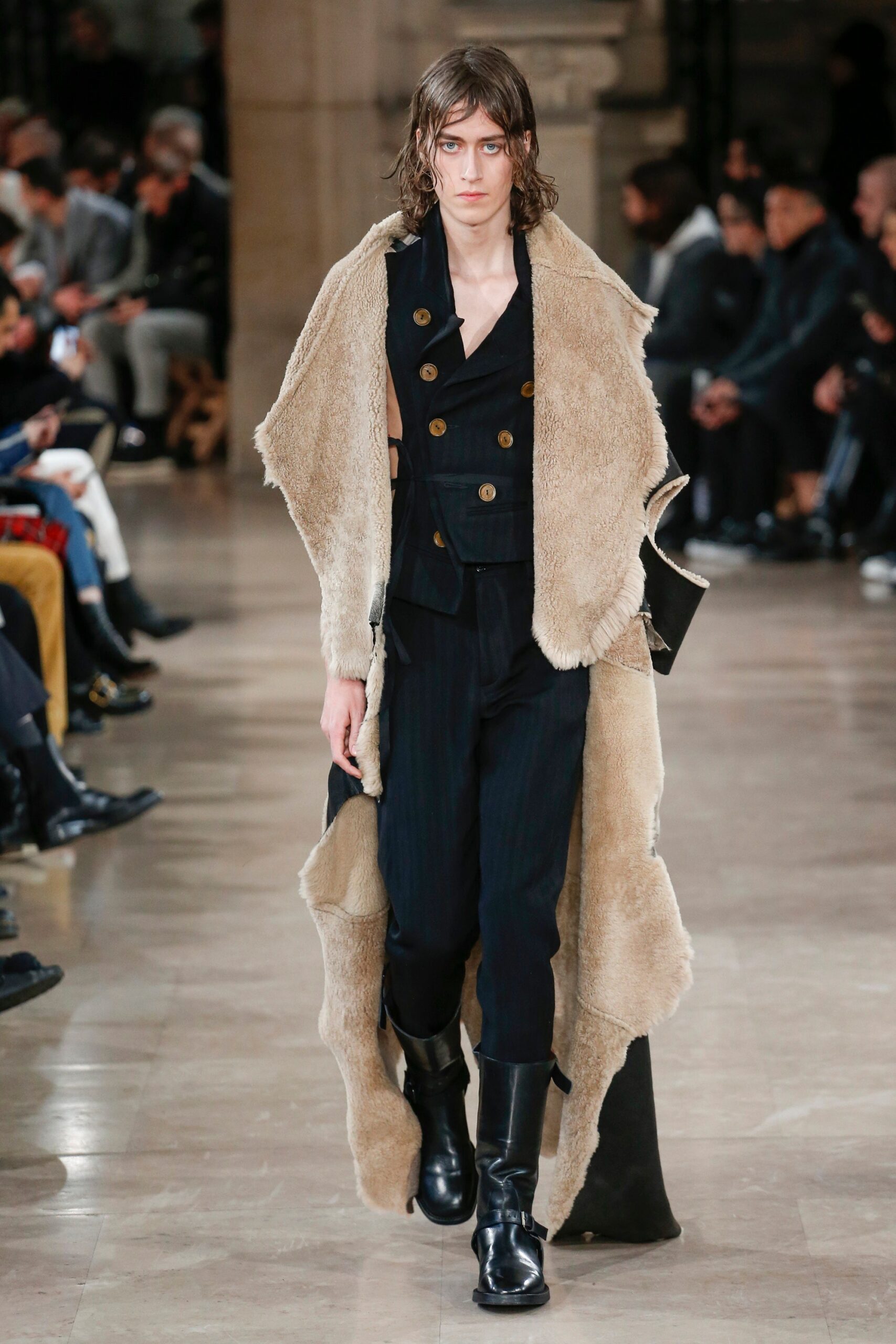 beige faux-fur coat with black jacket